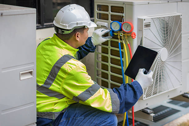 Professional Air Conditioning Repair technician working in Hanson, MA